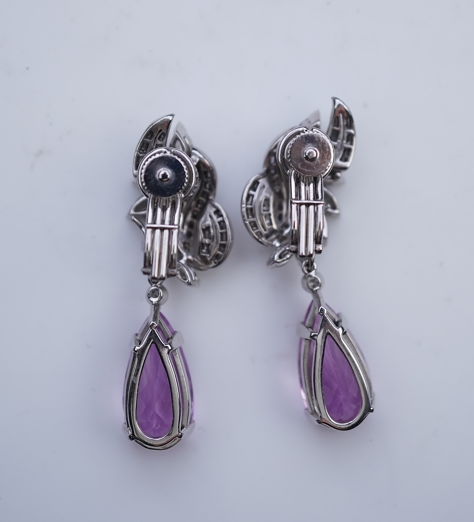 An attractive pair of 'day and night' kunzite and diamond ear clips